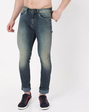 albert mid-wash slim fit jeans with distressing