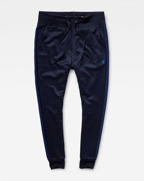 alchesai slim tapered joggers with contrast taping