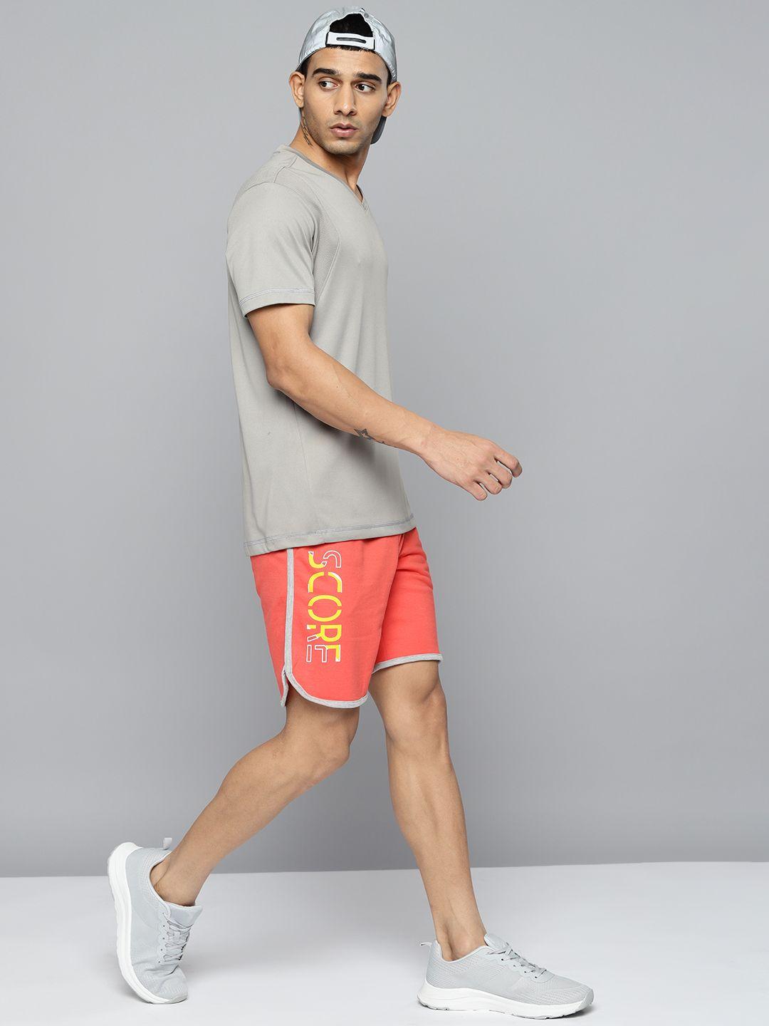 alcis men peach-coloured typography printed running shorts