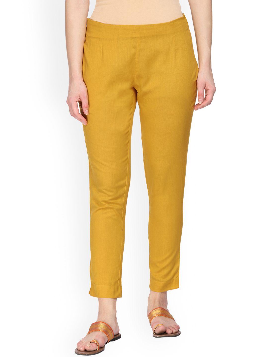 alena women mustard regular fit solid cigarette trousers