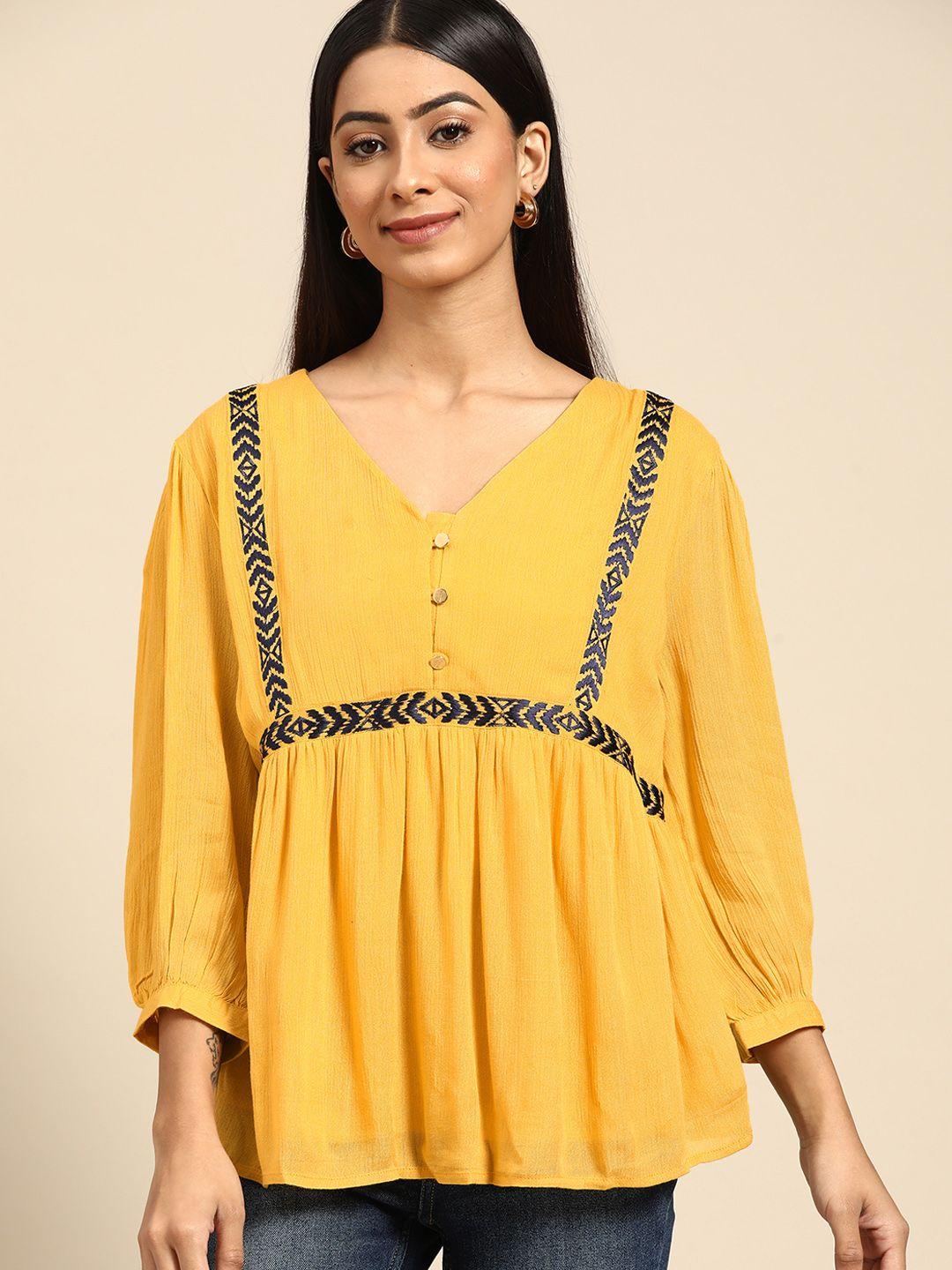 all about you mustard yellow & purple geometric embroidered top