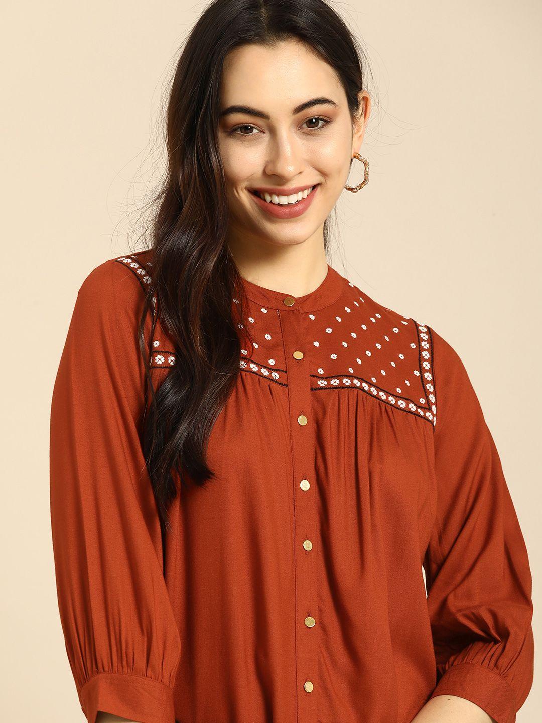 all about you rust red geometric embroidered top