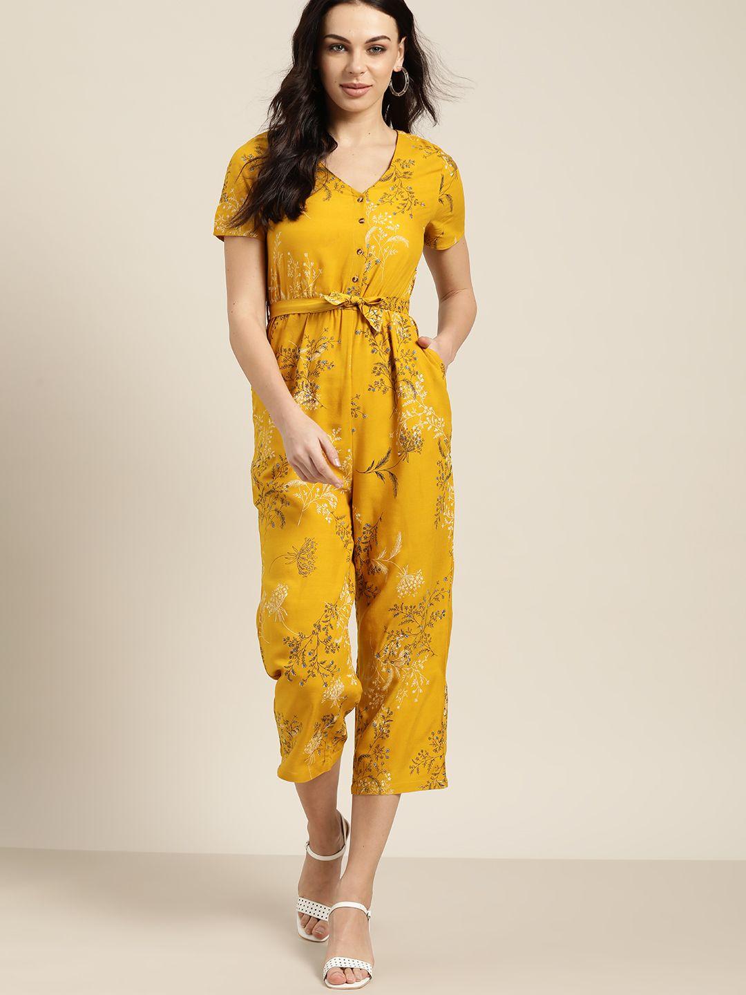 all about you women mustard yellow & black floral printed cropped jumpsuit