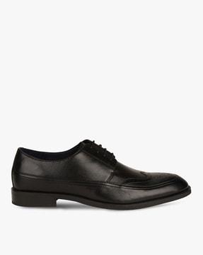 almond-toe derby shoes with broguing