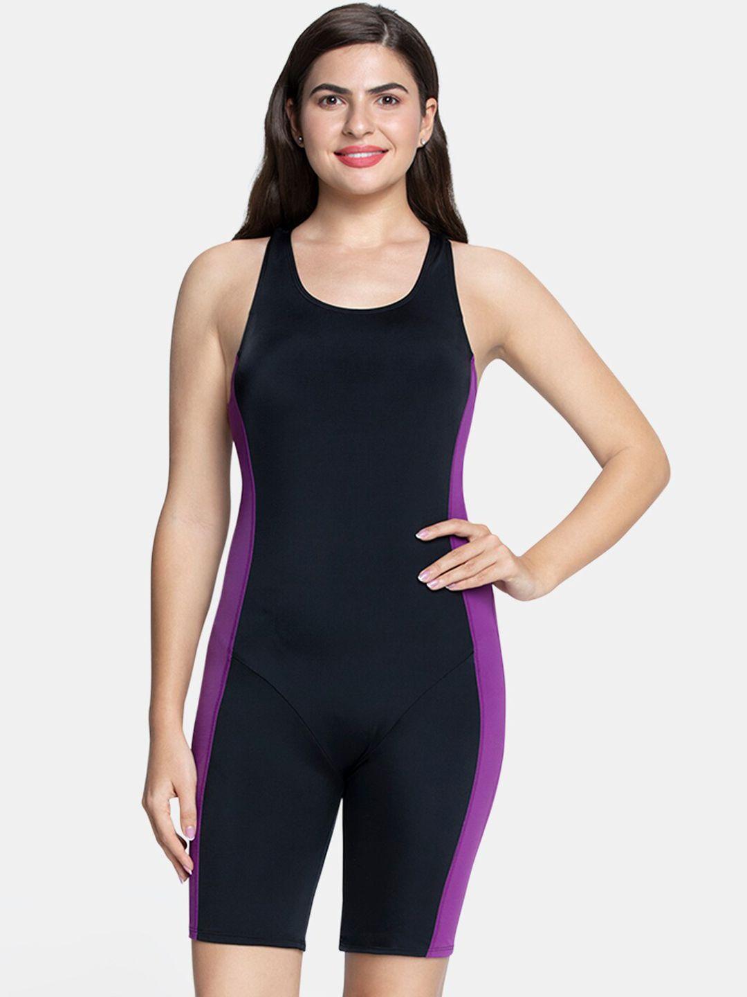 amante women black & purple solid padded legsuit swimwear