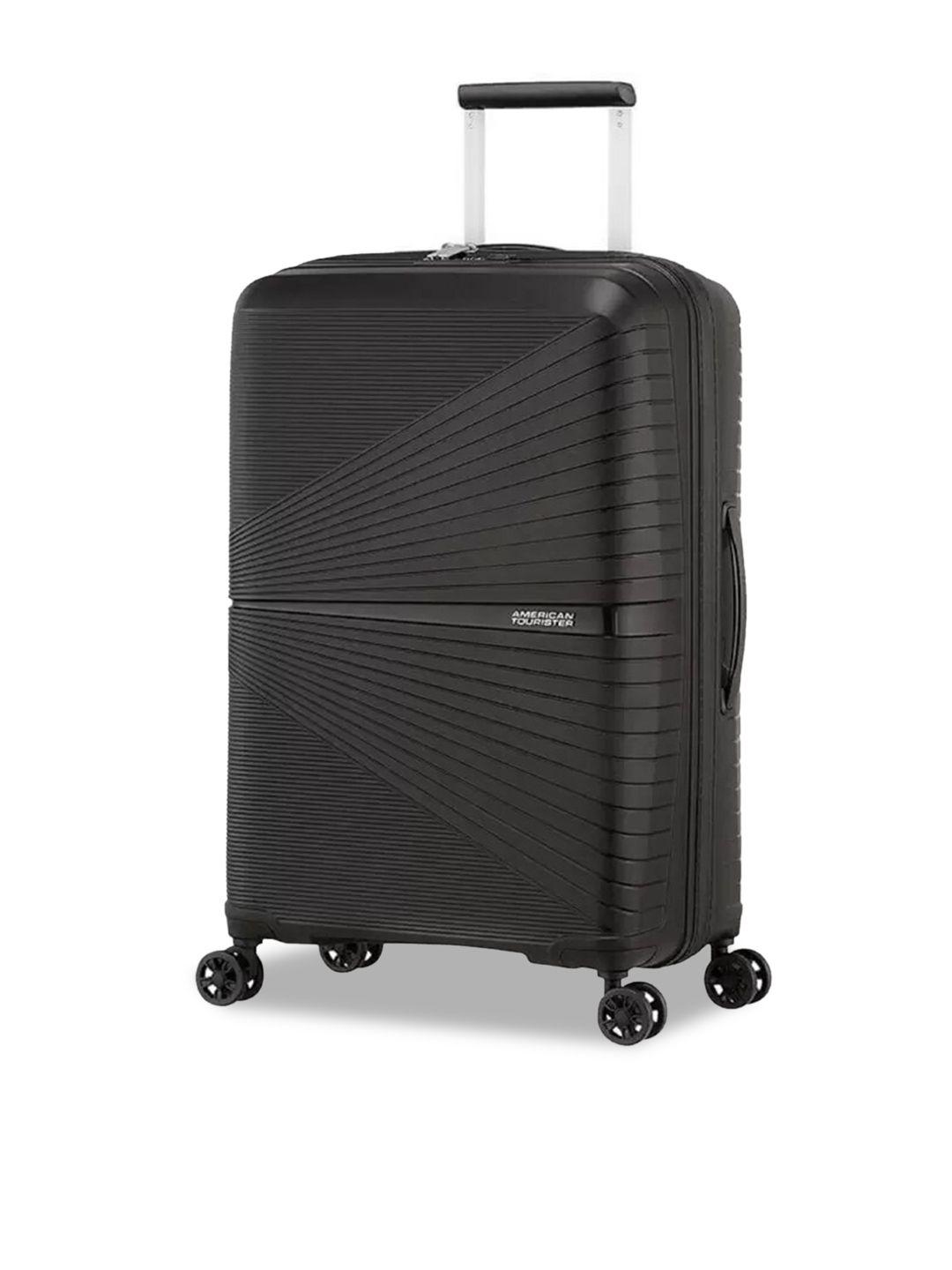 american tourister black solid large trolley bag