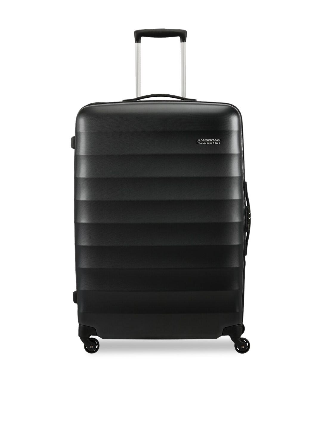 american tourister unisex charcoal grey solid hard-sided barcelona medium trolley suitcase