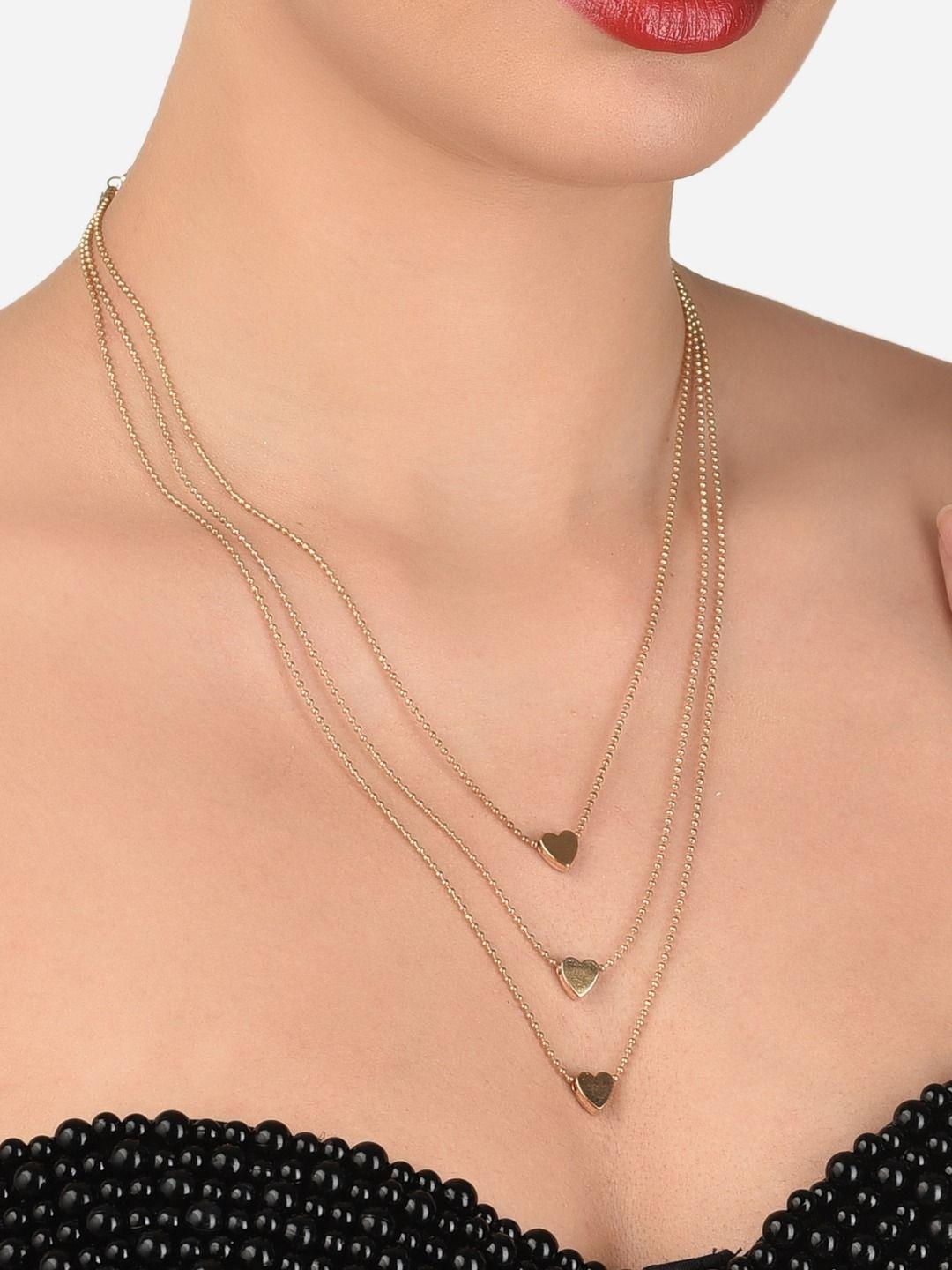 ami women gold necklace and chains