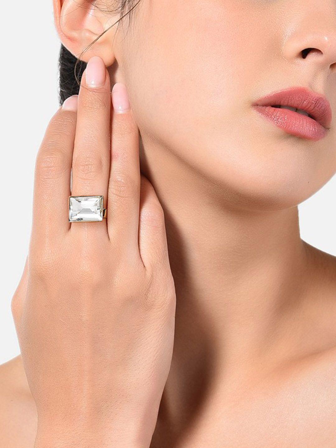 ami gold-plated white stone-studded adjustable finger ring