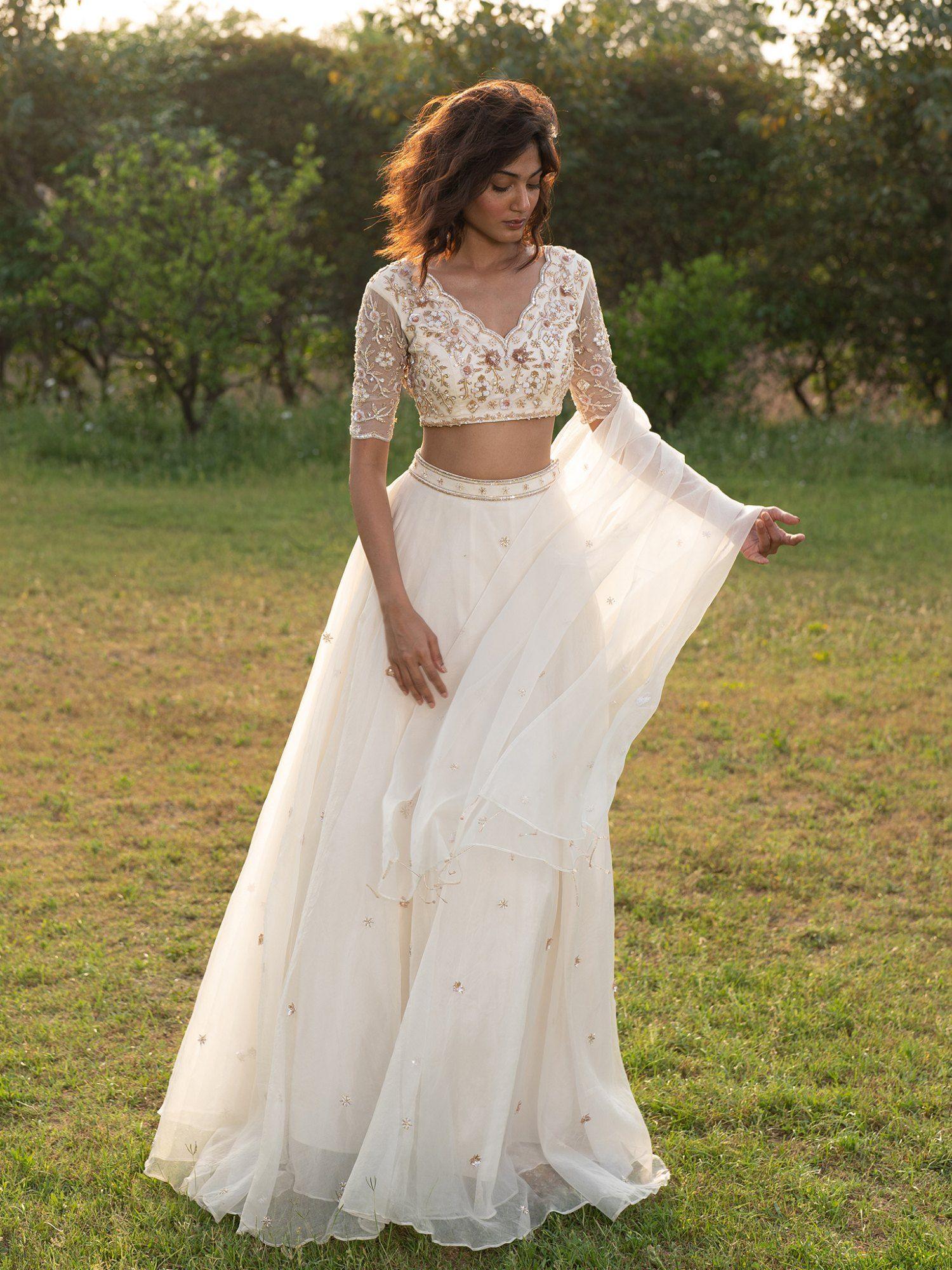 an ivory embroidered- sequined lehenga with blouse and dupatta (set of 3)