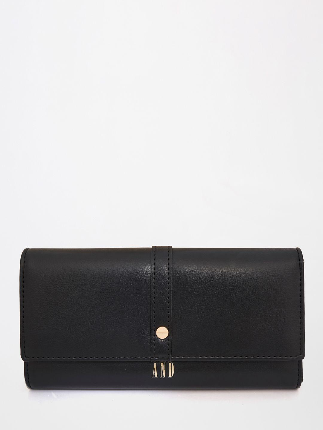 and black envelope clutch