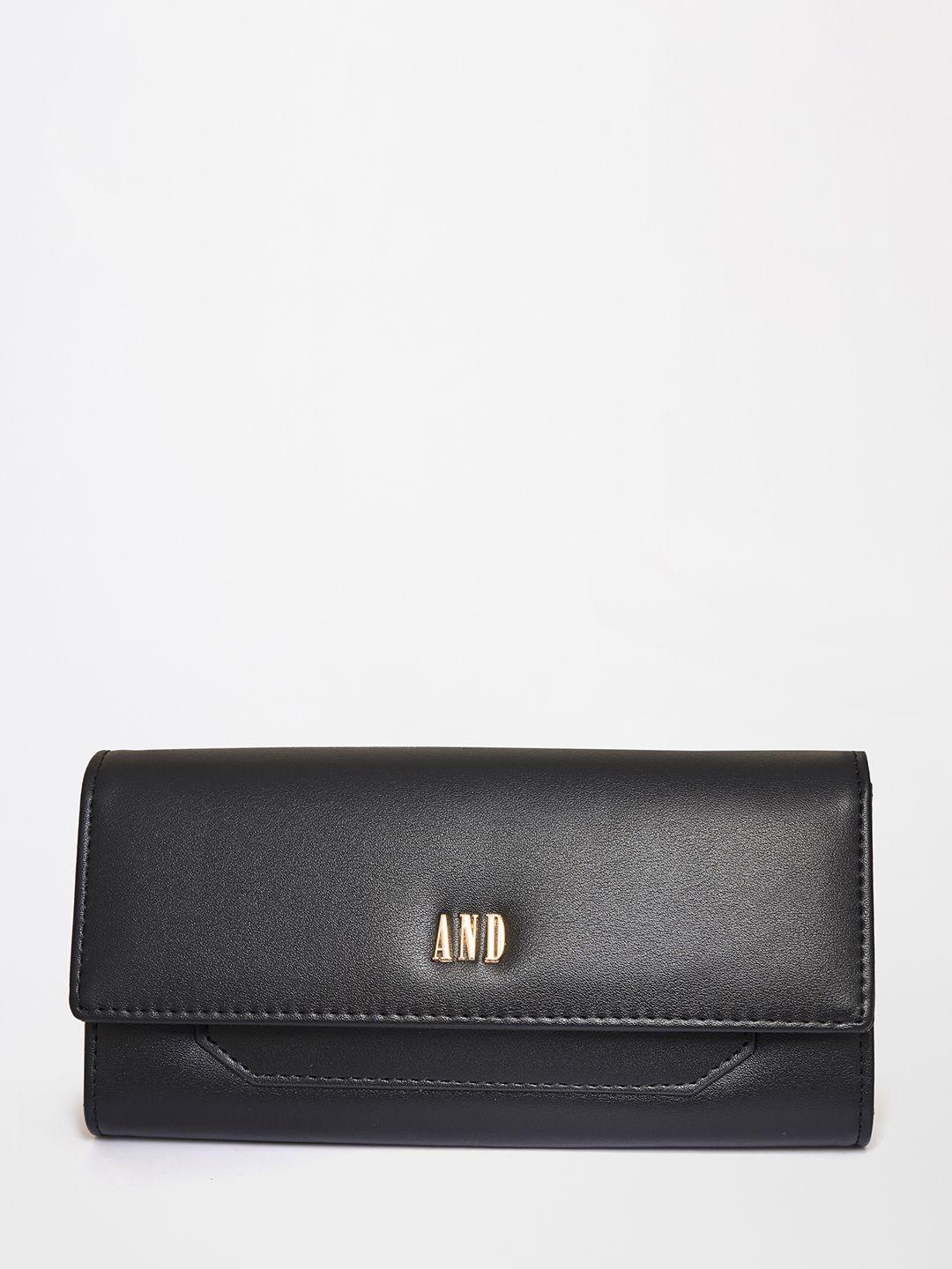 and black envelope clutch