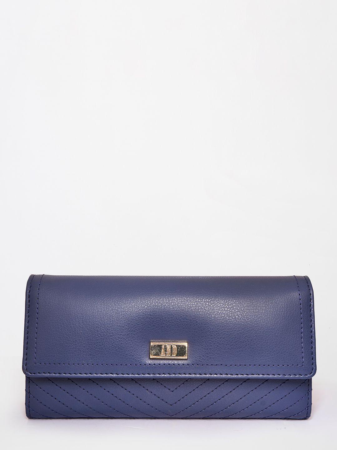 and navy blue envelope clutch