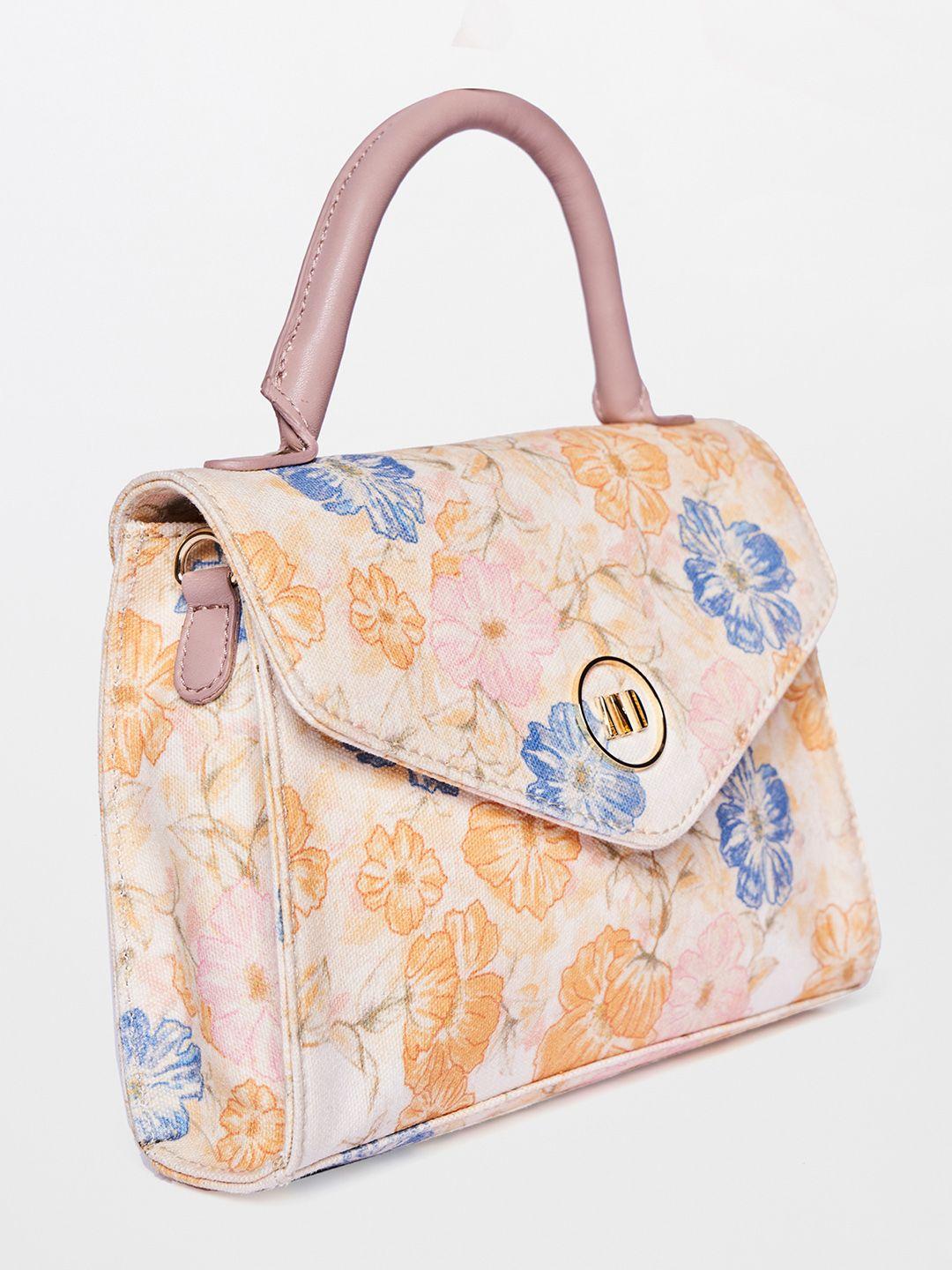 and women beige floral printed canvas structured handheld bag