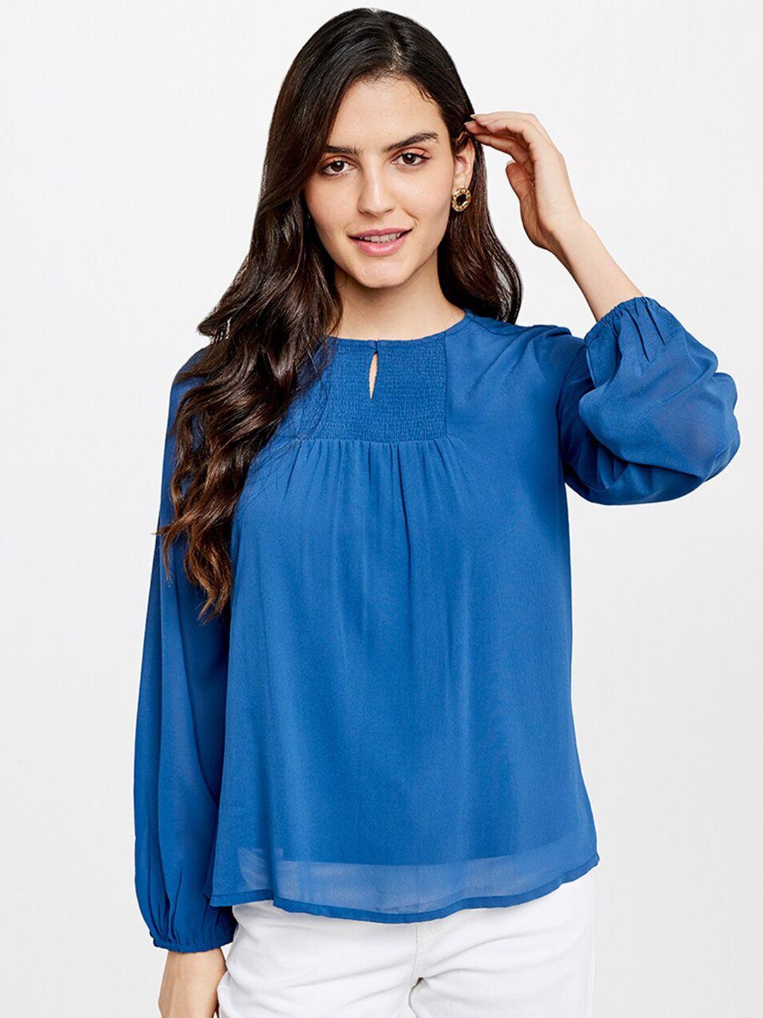 and women blue keyhole neck top