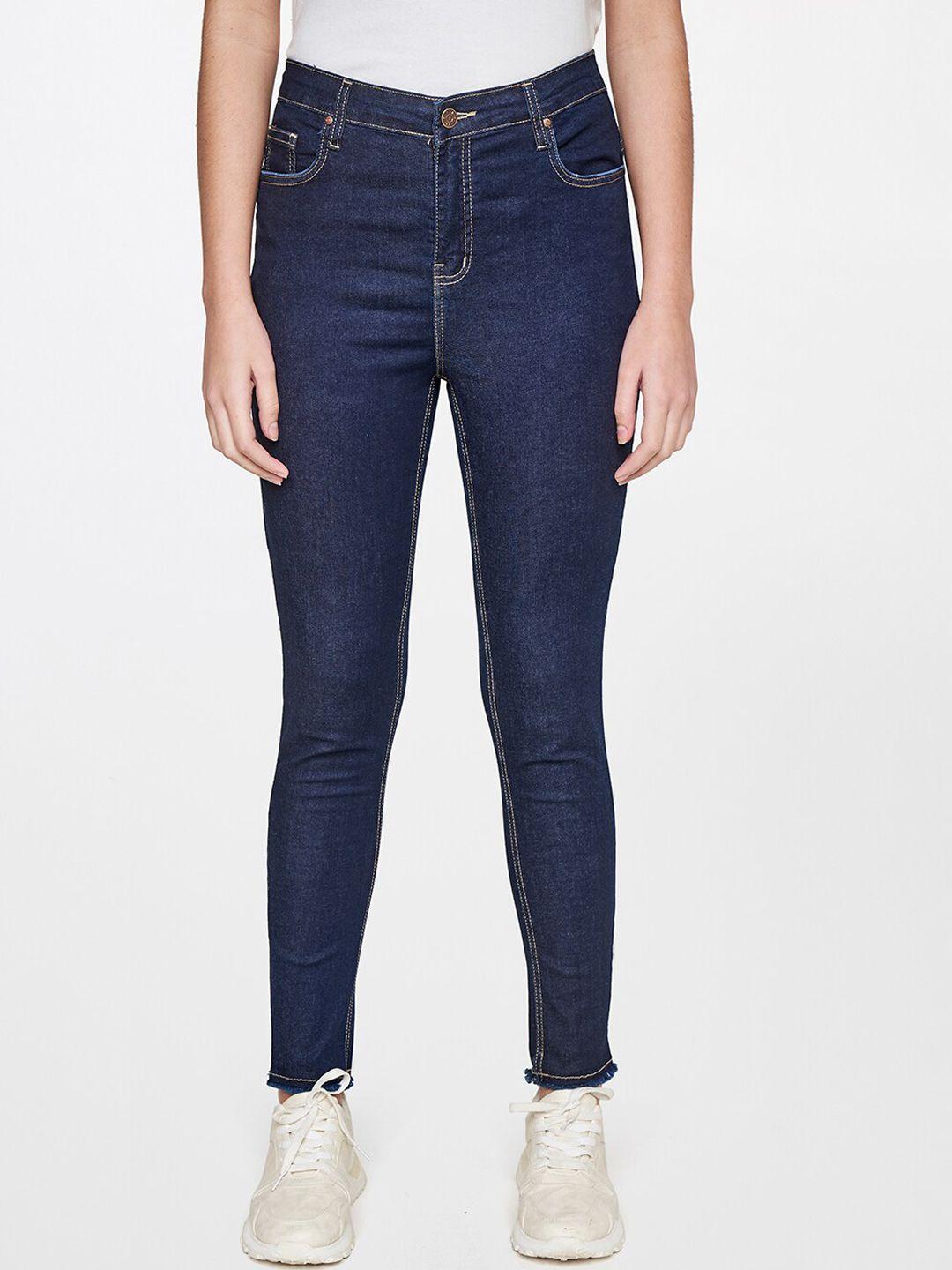 and women blue skinny fit trousers