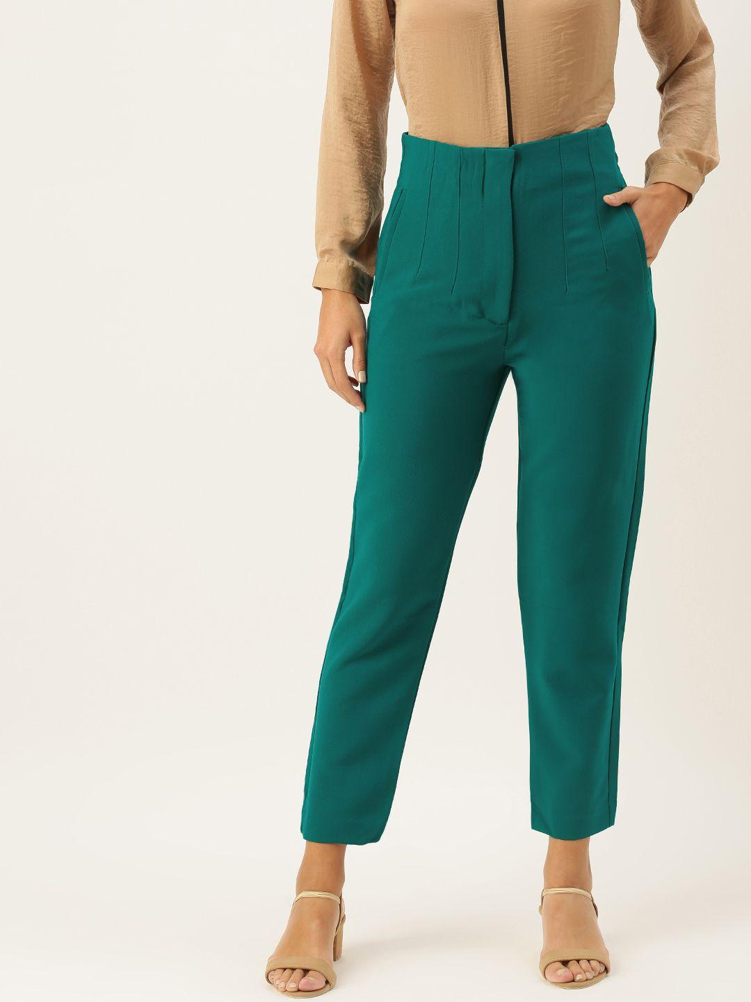 and women green tapered fit trousers