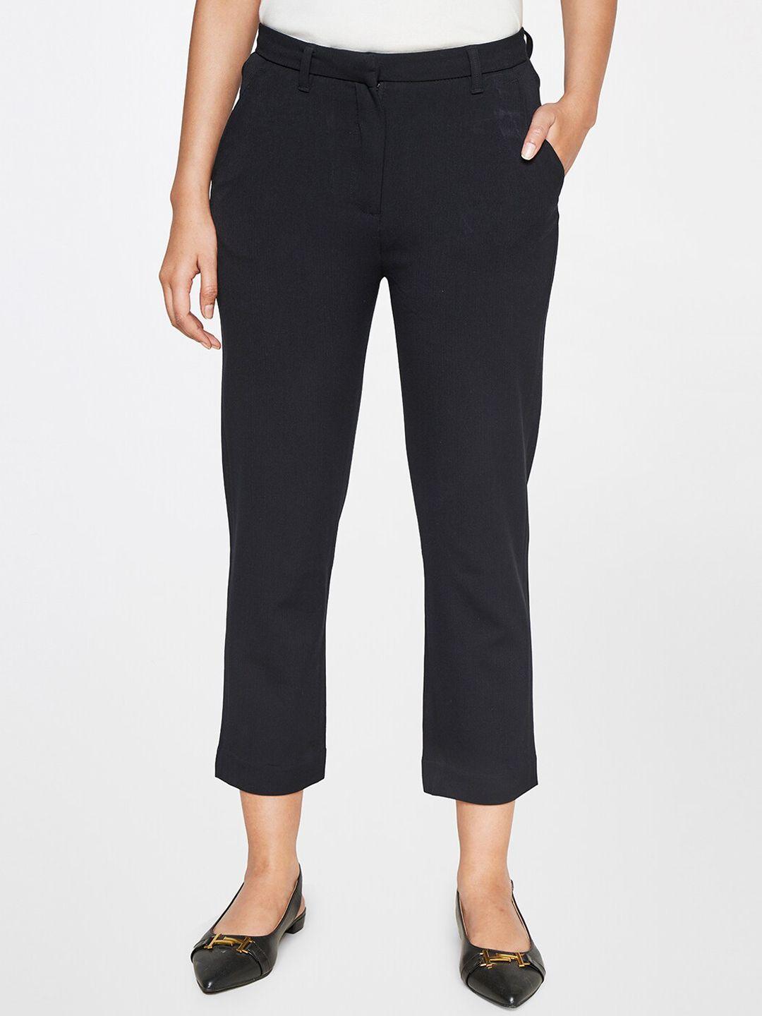 and women mid -rise tapered fit trousers