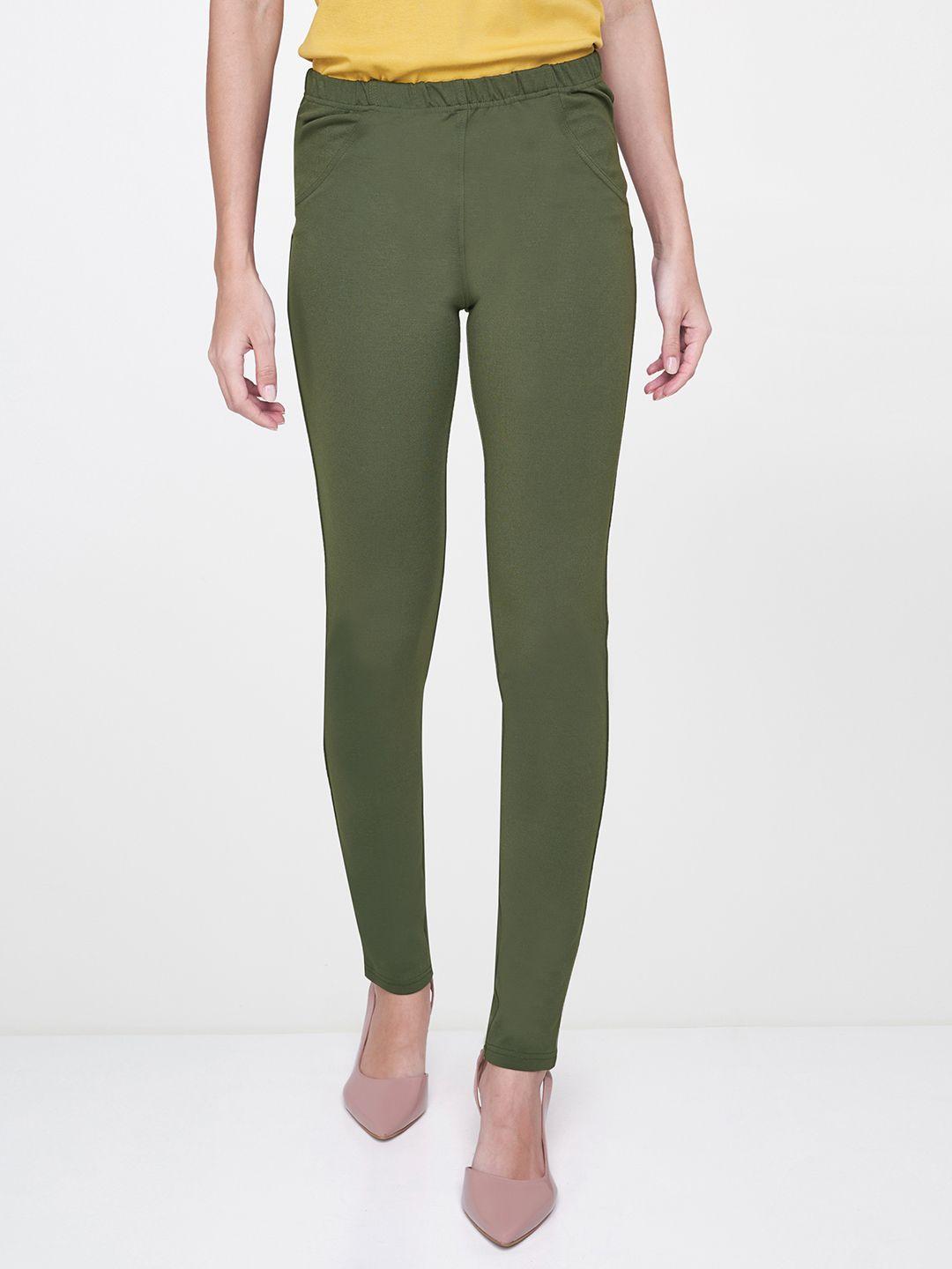and women olive green solid skinny fit treggings