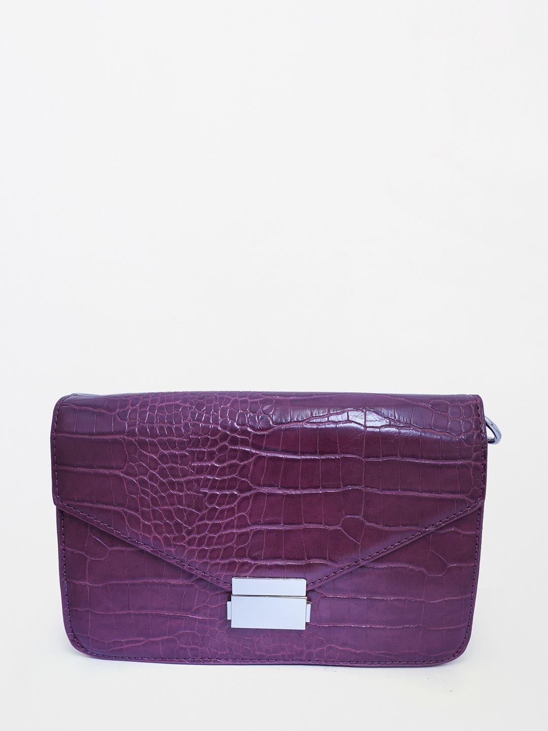 and women purple animal textured structured sling bag
