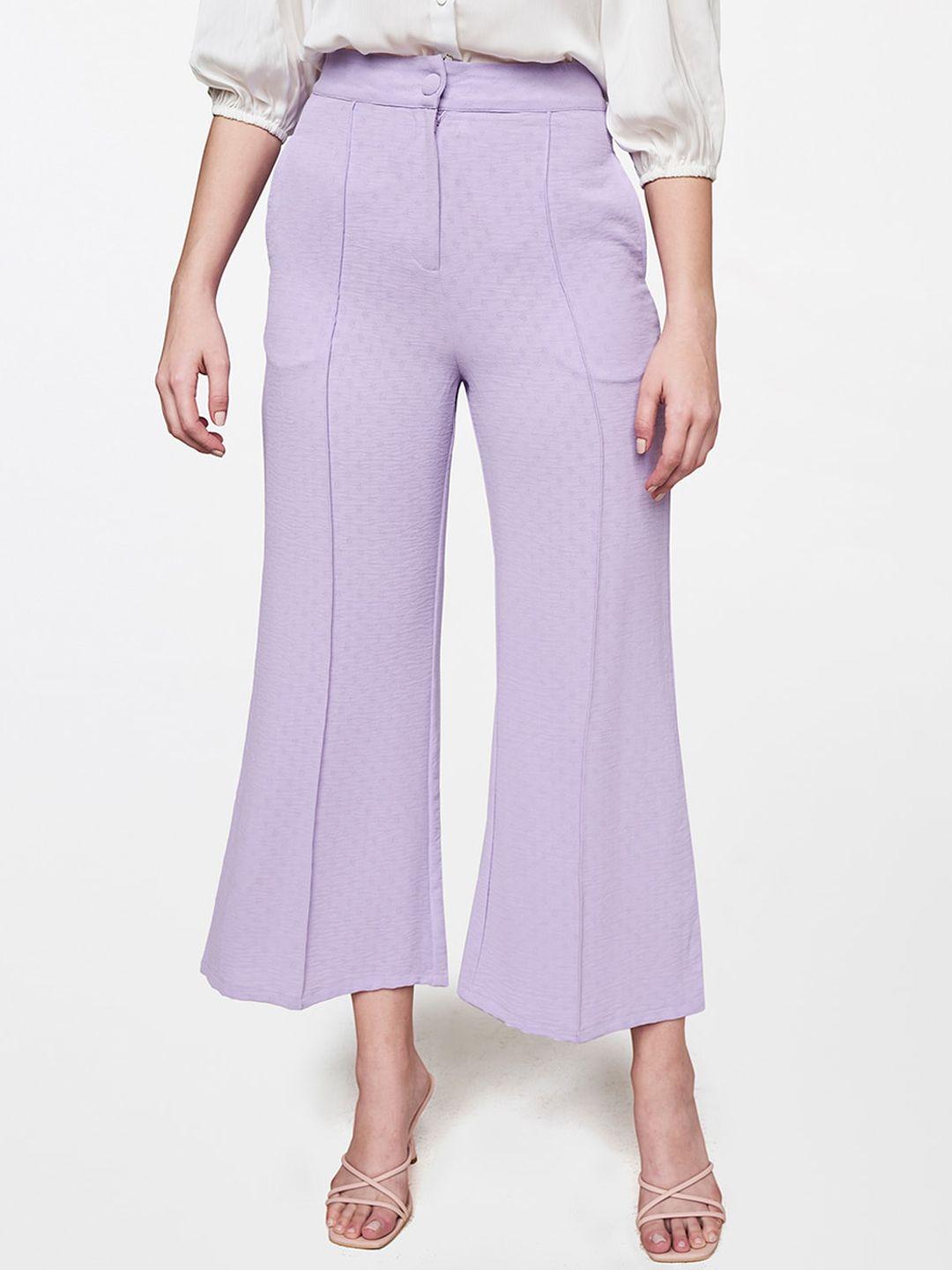 and women purple flared trousers