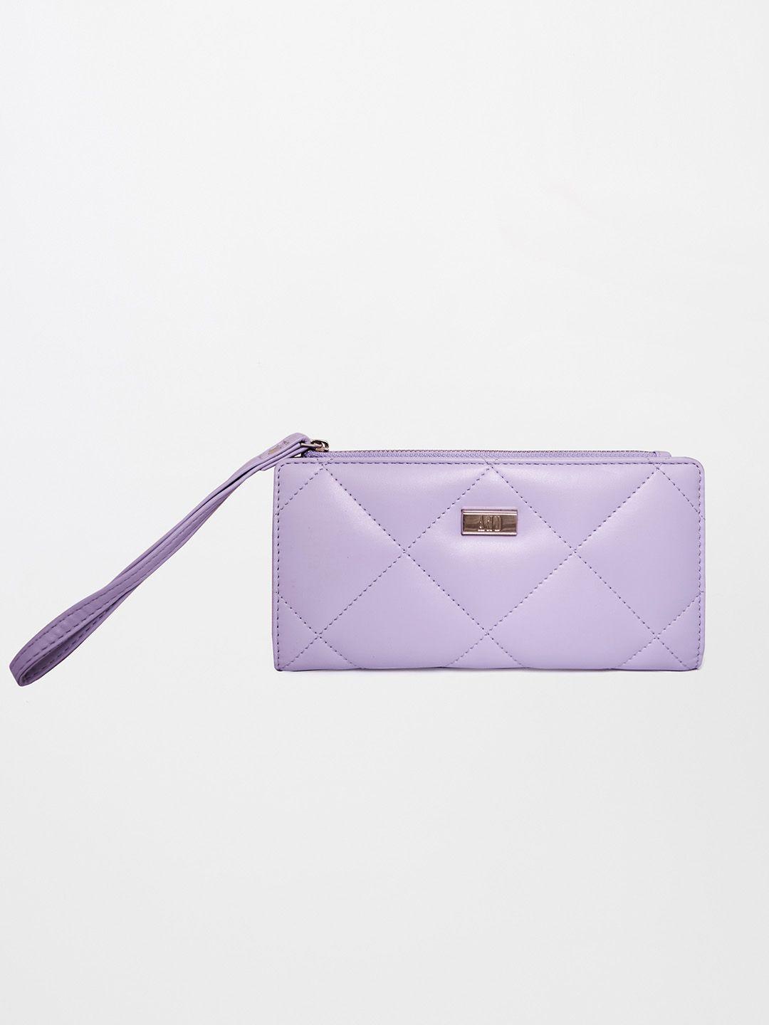 and women purple textured quilted purse clutch
