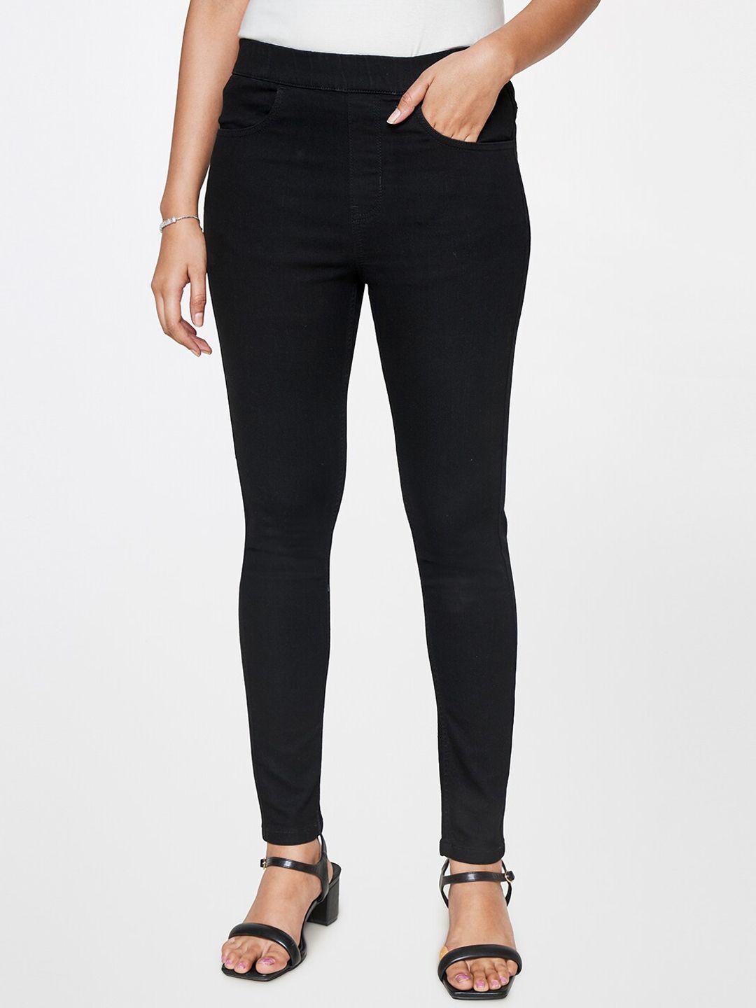 and women skinny fit mid-rise trousers