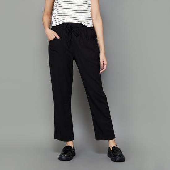 and women solid elasticated trousers