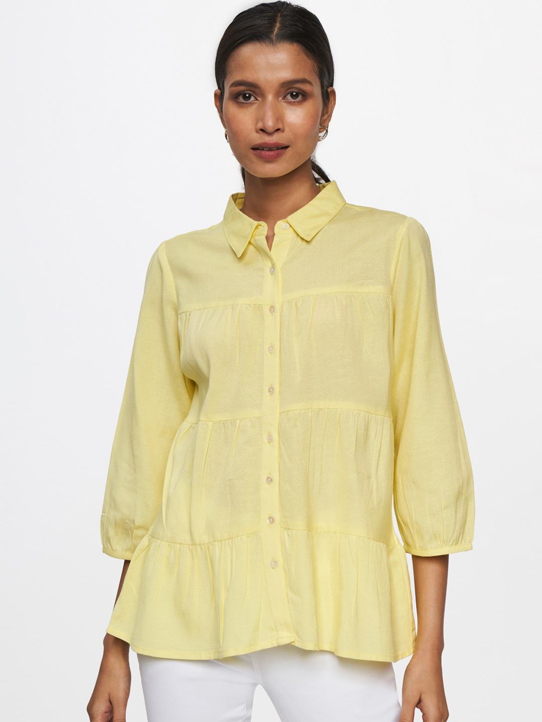 and yellow shirt style top