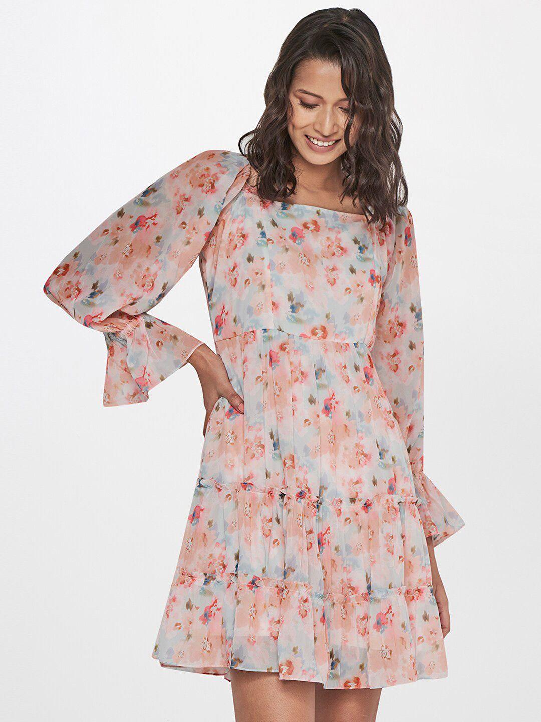 and floral smocked tiered fit and flare dress