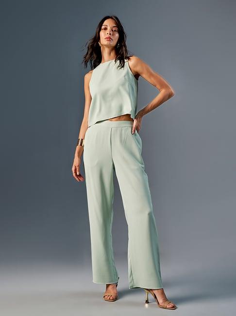 and mint green top with pants