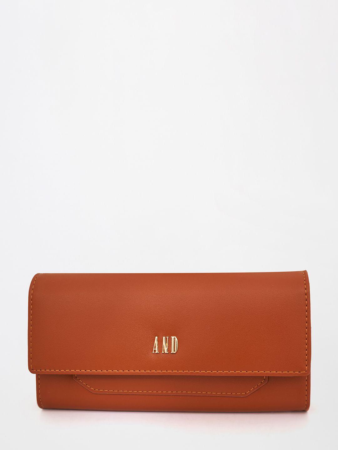 and tan envelope clutch