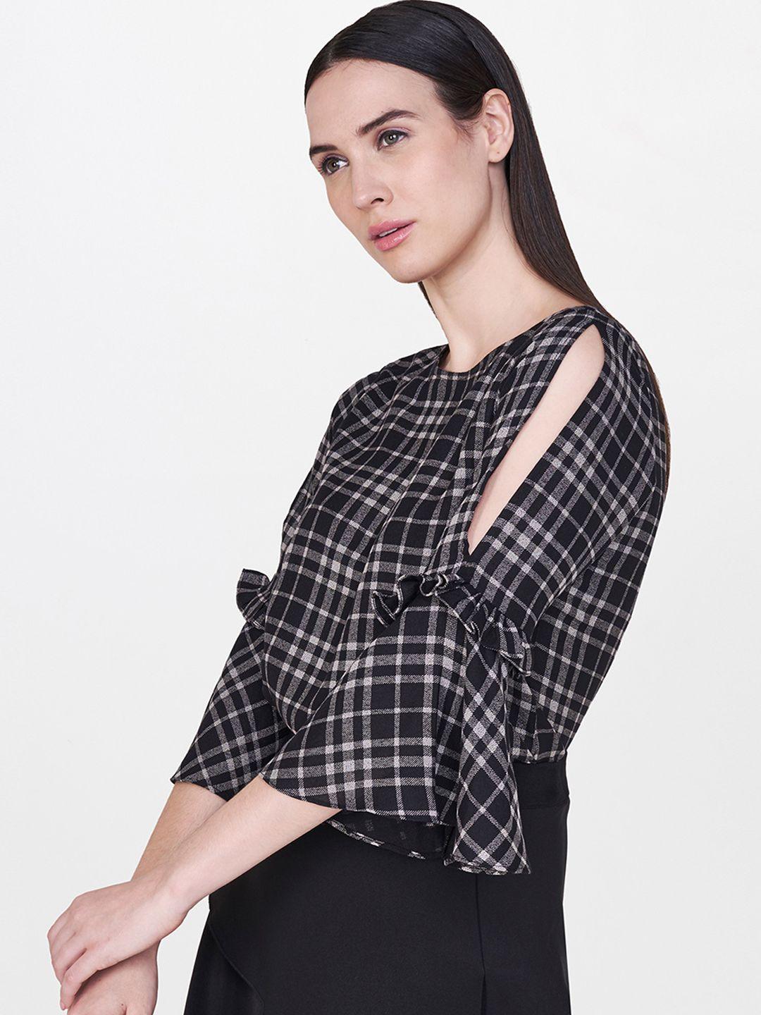 and women black & off-white checked top