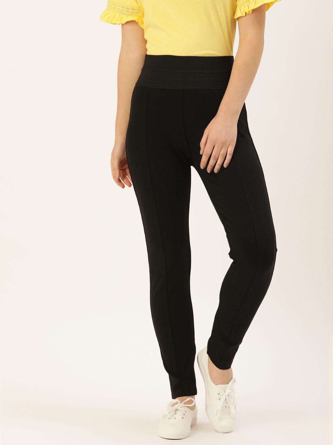 and women black slim fit solid regular trousers