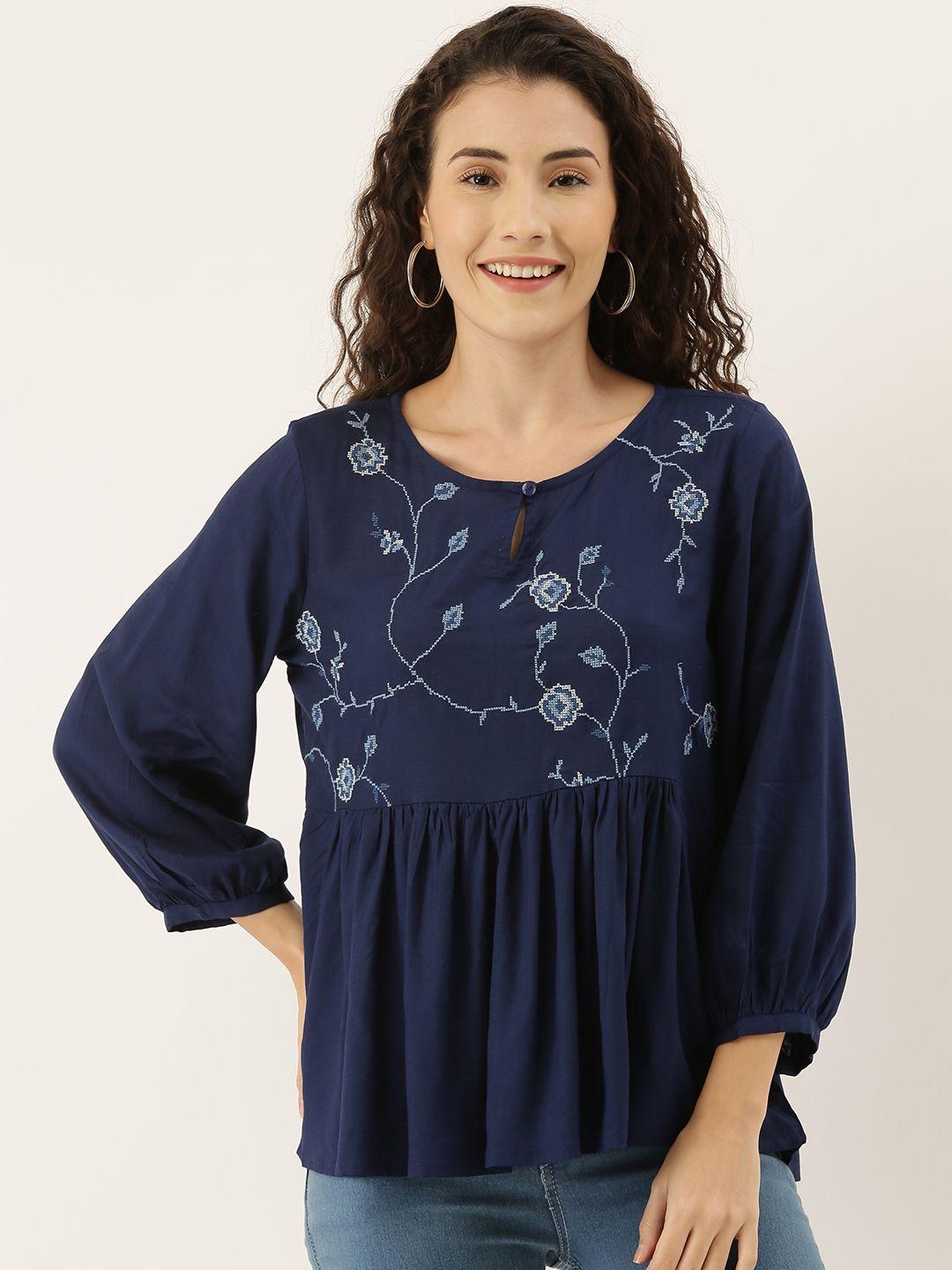 and women blue embroidered top