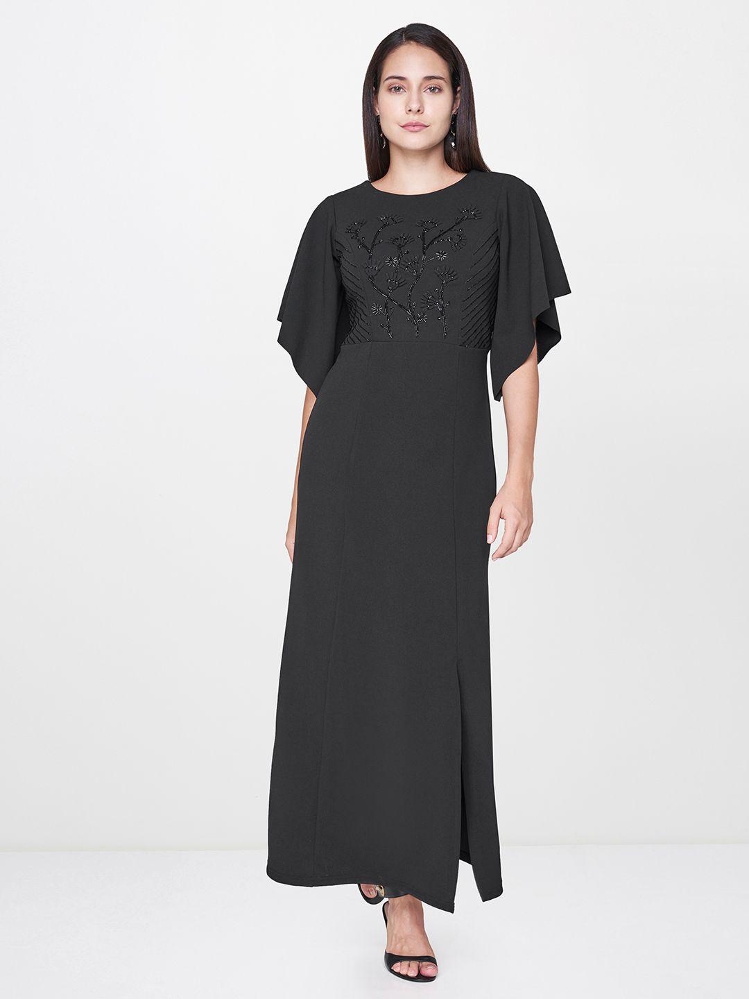 and women embellished black a-line dress