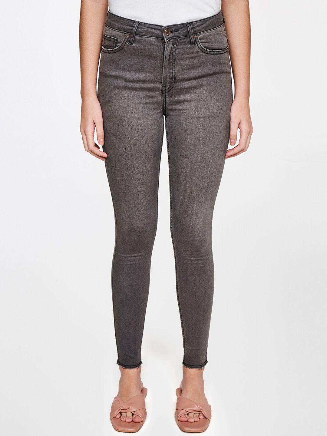 and women grey skinny fit trousers