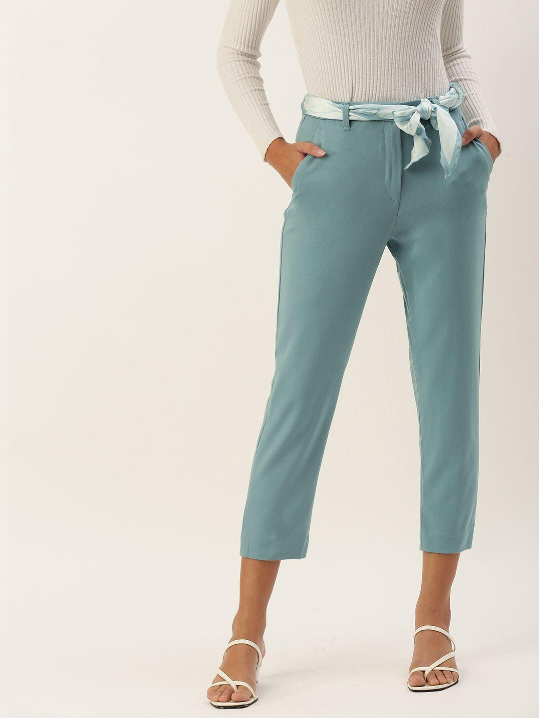 and women mid-rise trousers with fabric waist belt
