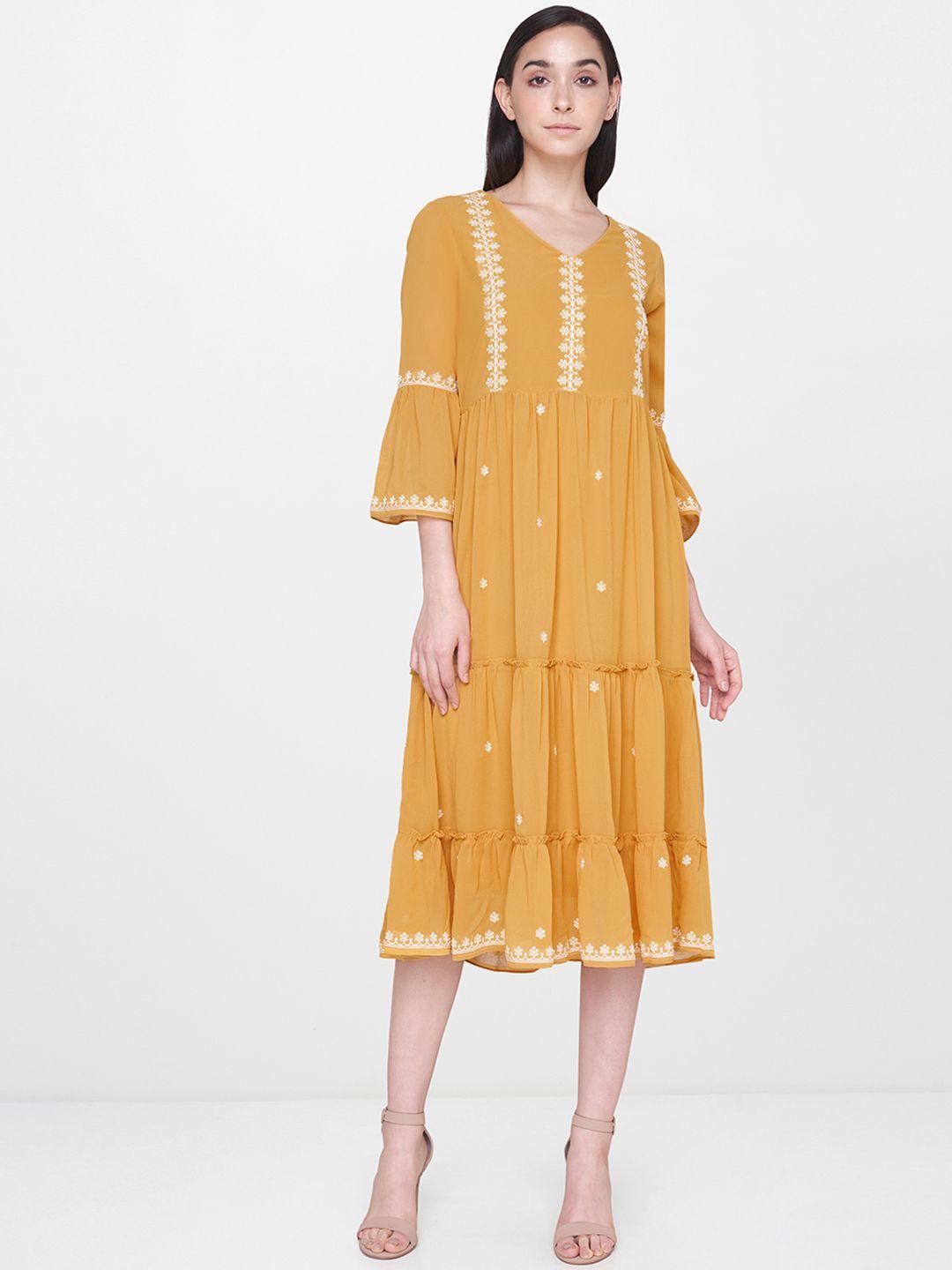 and women mustard yellow embroidered fit and flare dress