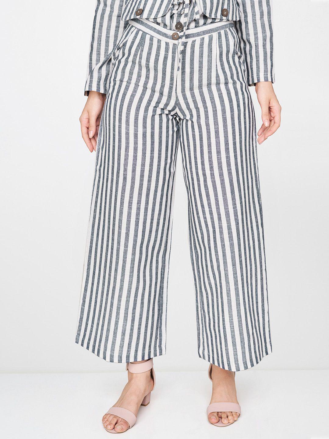 and women navy blue & white regular fit striped parallel trousers