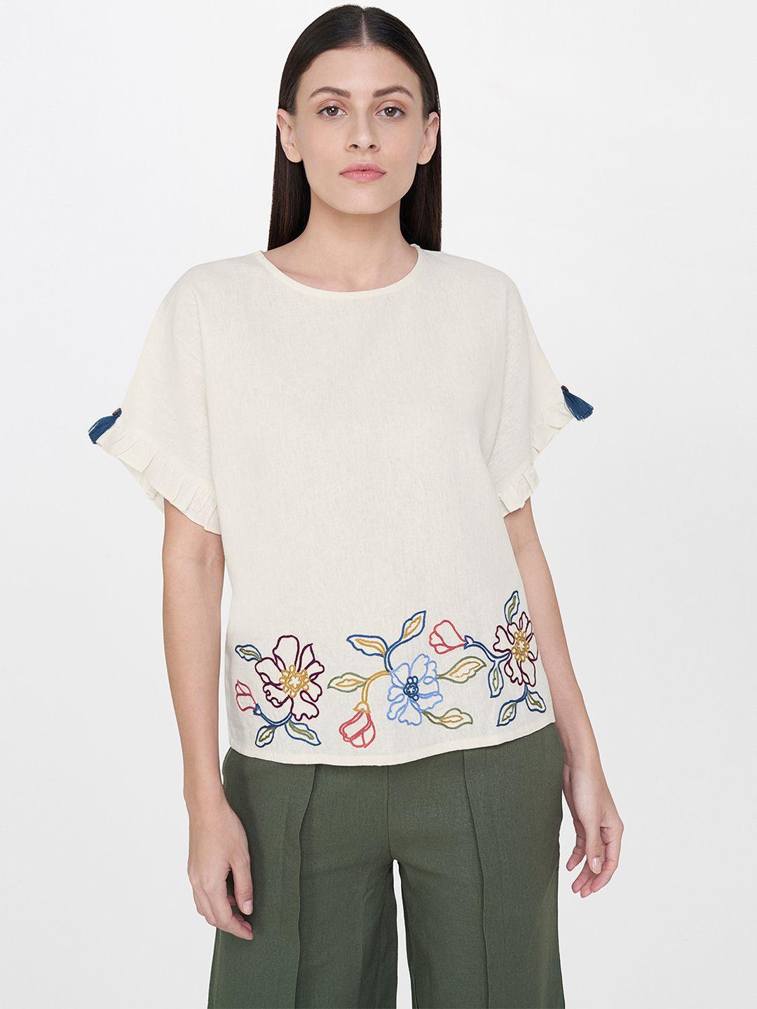 and women off-white solid boxy top with embroidered details