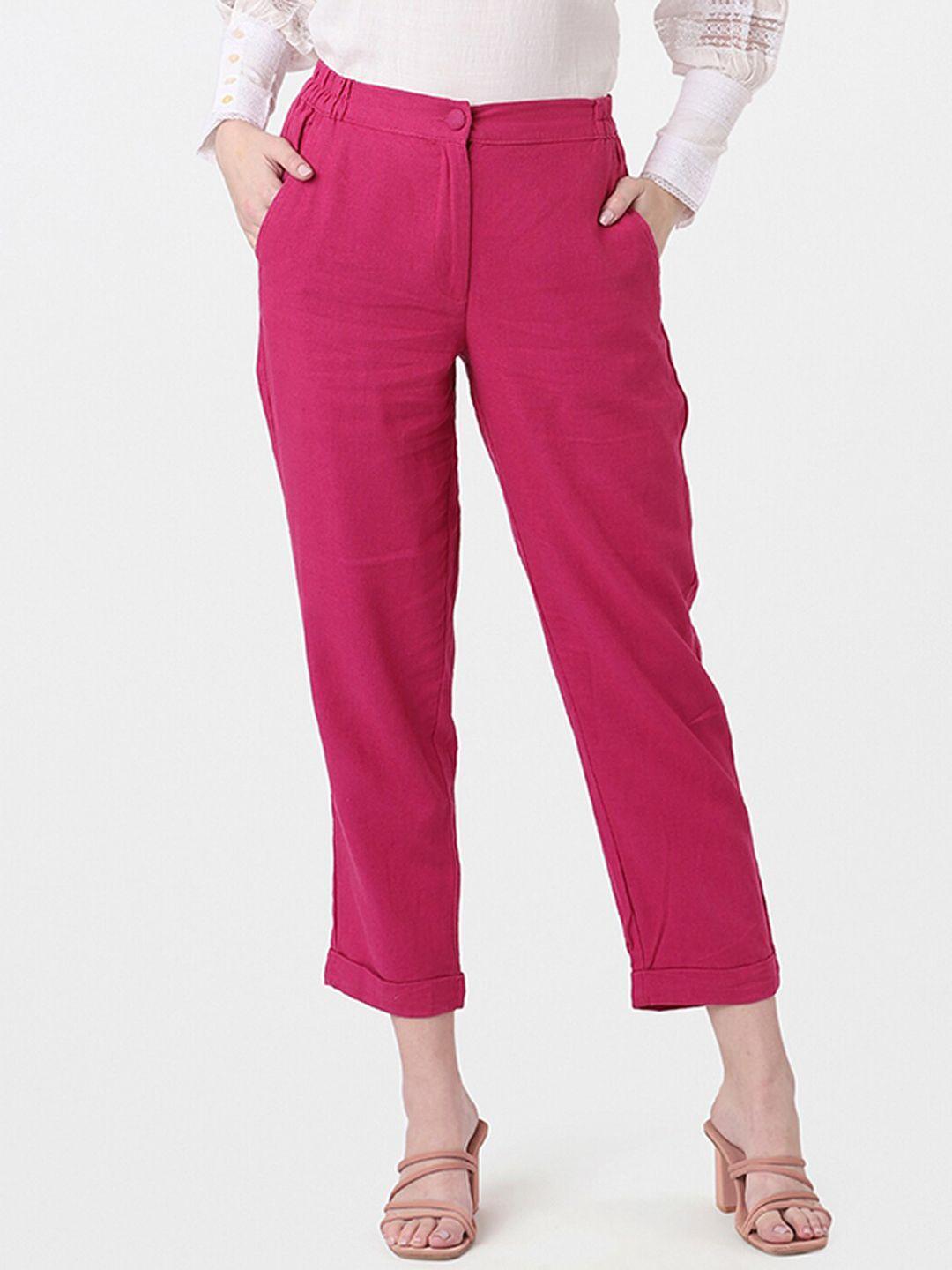 and women pink tapered fit trousers