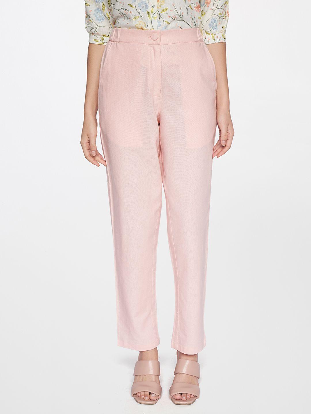 and women pink trousers