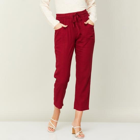 and women solid elasticated cropped pants