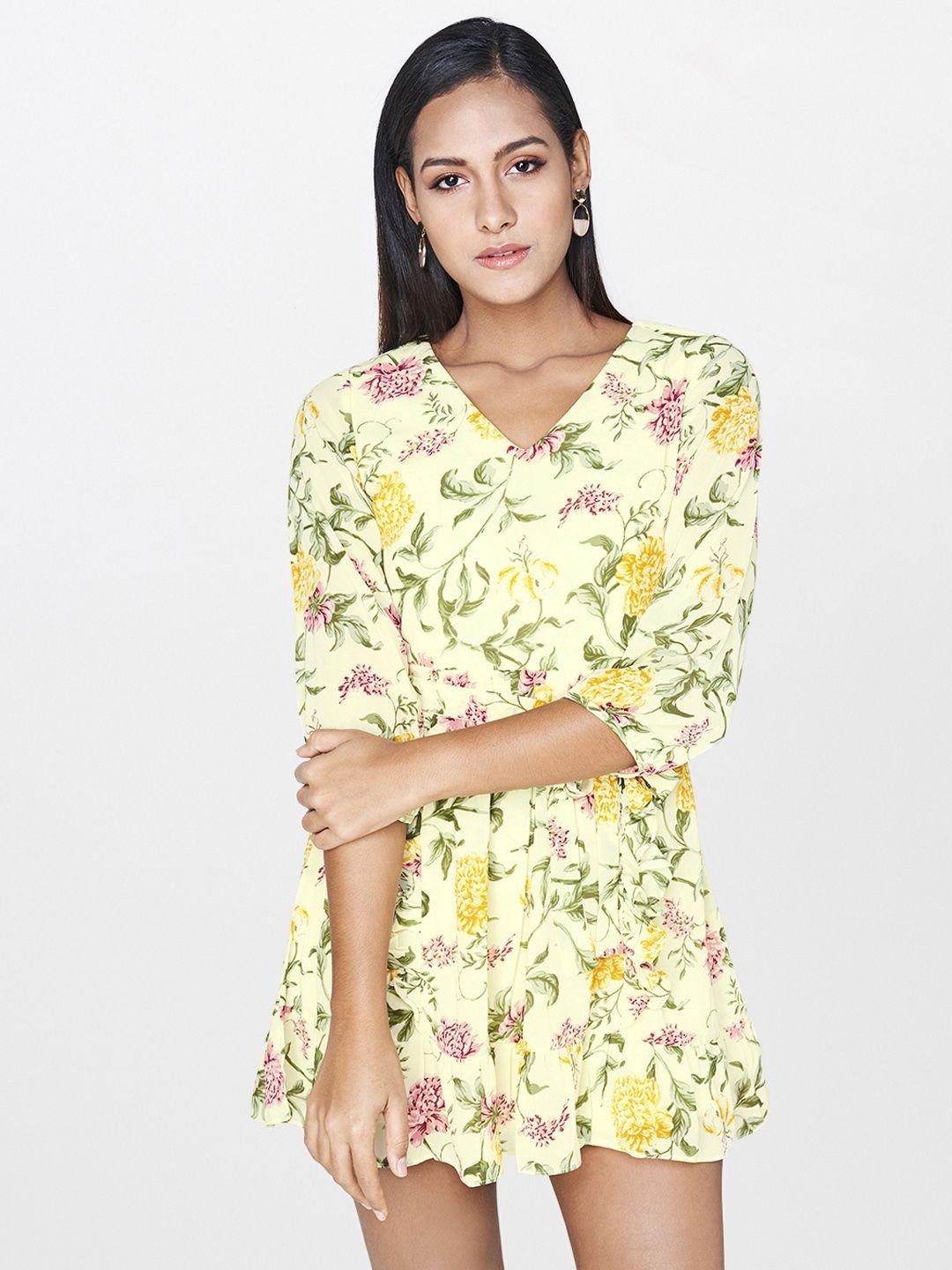 and women yellow printed fit and flare dress