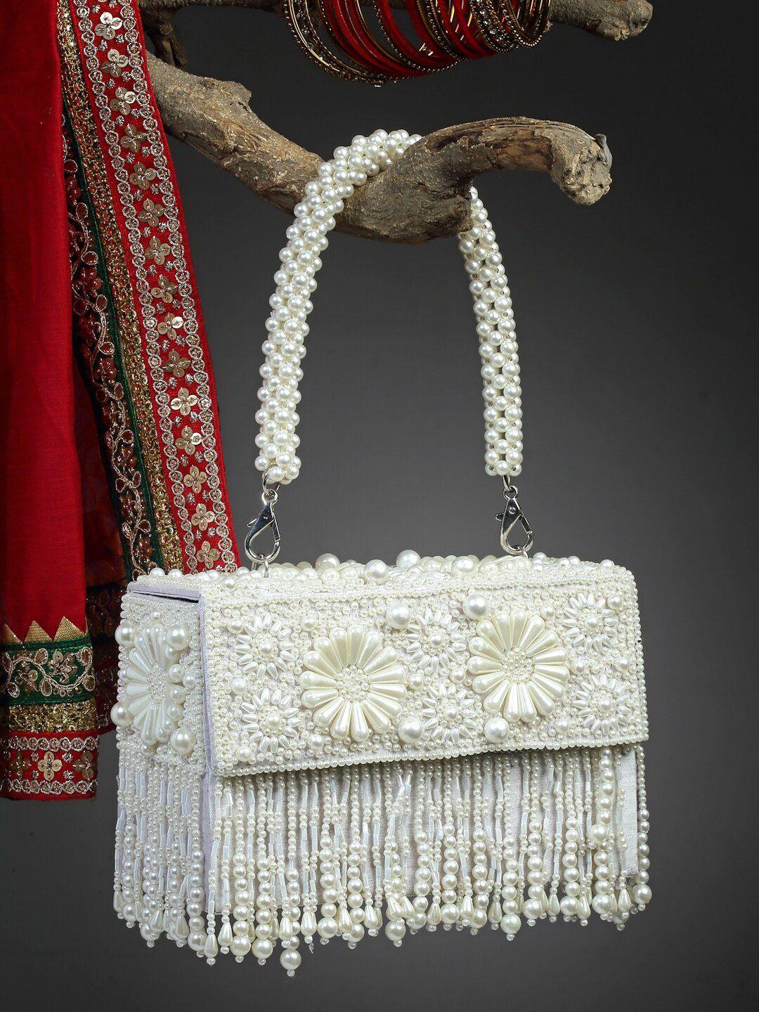 anekaant embellished tasselled foldover clutch