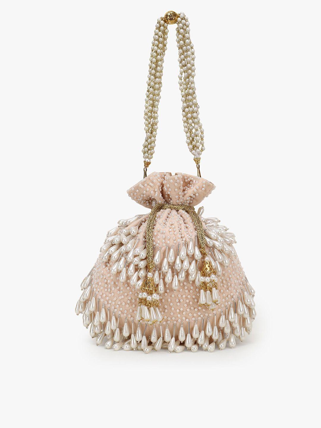 anekaant peach-coloured & white embroidered tasselled velvet potli clutch