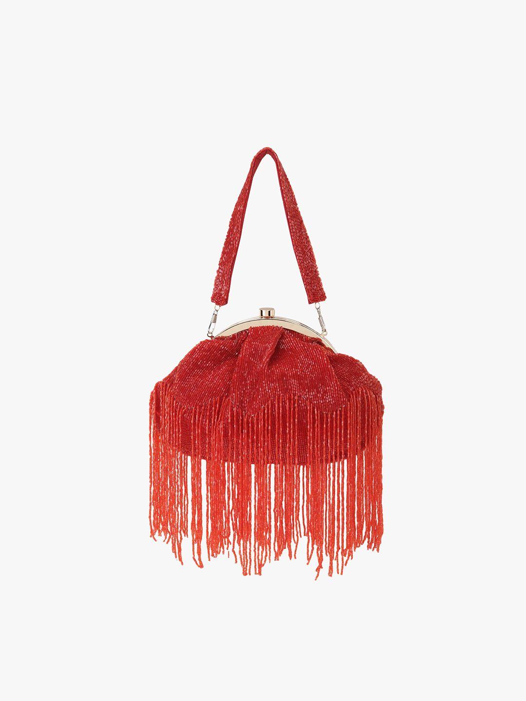 anekaant red embellished tasselled purse clutch
