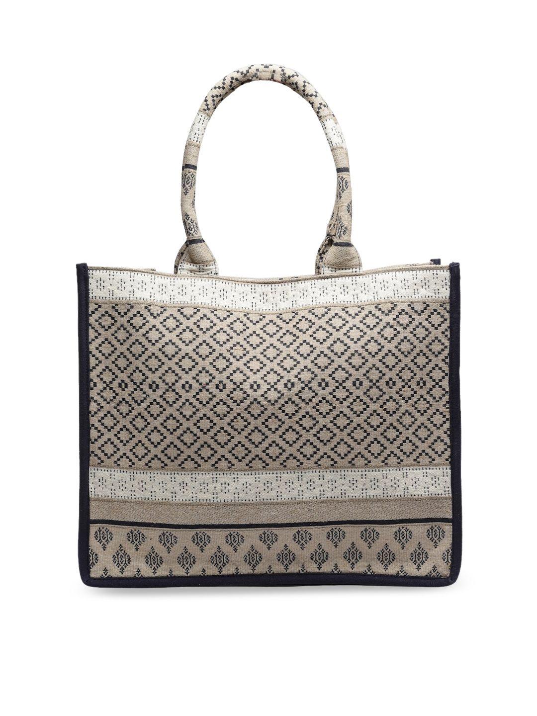 anekaant textured structured handheld bag