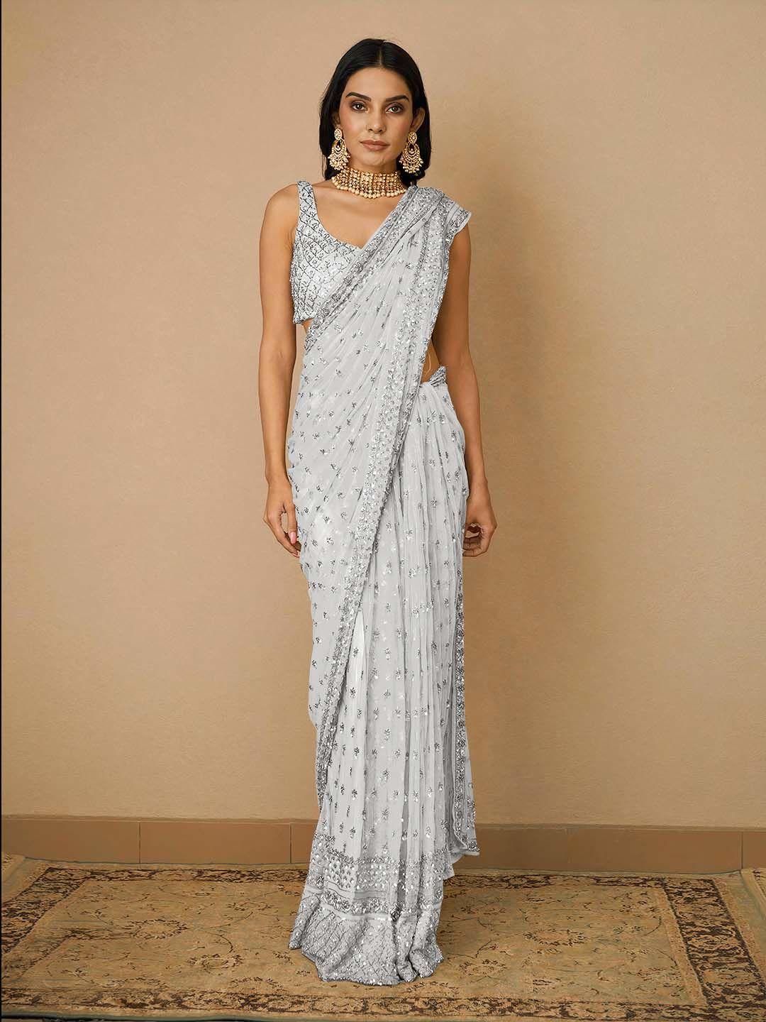 angroop woven design embellished sequinned net saree